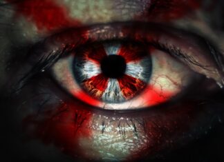 Un particolare del poster del film horror Resident Evil: Welcome to Raccoon City.