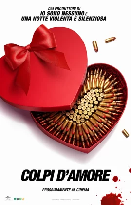 Il primo poster del film Colpi d'amore con una scatola di cioccolatini pieni di proiettili.