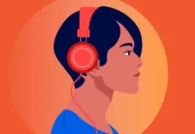 In foto una ragazza che ascolta un audible.