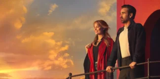 Colin Farrell e Margot Robbie in una scena di A Big Bold Beautiful Journey.