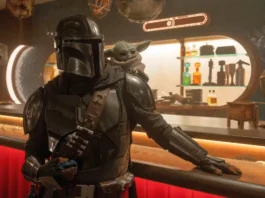 Pedro Pascal e Grogu nel film Star Wars: The Mandalorian and Grogu.