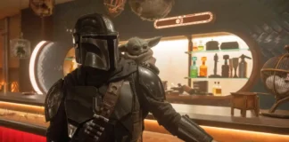 Pedro Pascal e Grogu nel film Star Wars: The Mandalorian and Grogu.