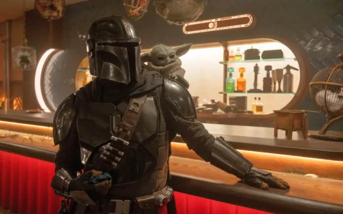 Mandalorian.grogu.recensione.cover Pedro Pascal e Grogu nel film Star Wars: The Mandalorian and Grogu.