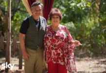 Money Road: Orietta Berti arriva nella giungla malese nel terzo episodio del reality Sky Fabio Caressa e Orietta Berti nella puntata 3 dell'edizione 2026 di Money Road.