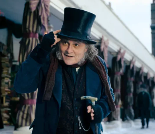 Johnny Depp nel film Scrooge e gli spiriti del Natale.